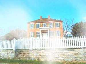 This photo, taken by a tourist of the Pry House, also used as a field hospital, may have captured a spectral presence.  The house itself has had many reports of ghosts haunting it.
